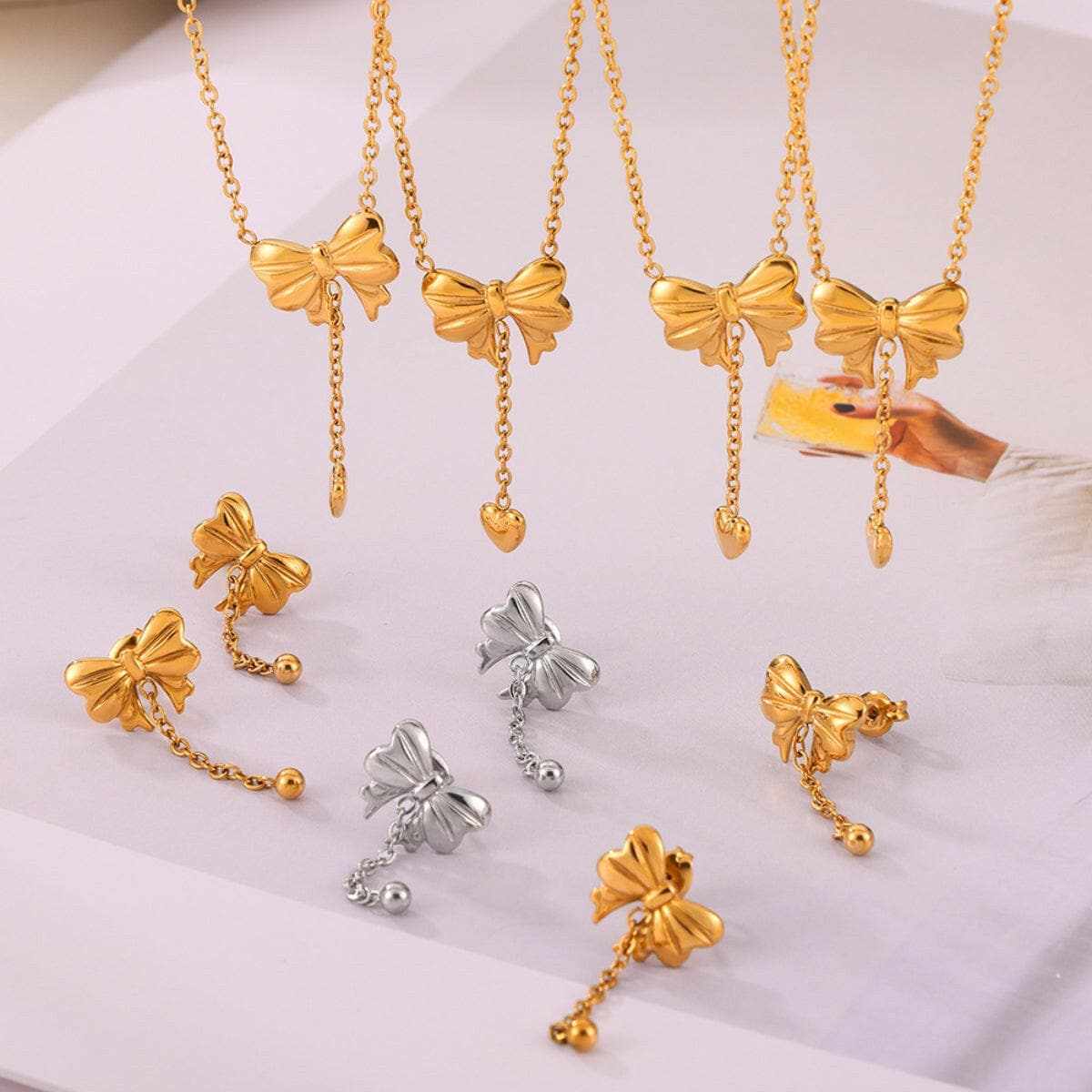 Elegant titanium steel bow earrings - Love Salve